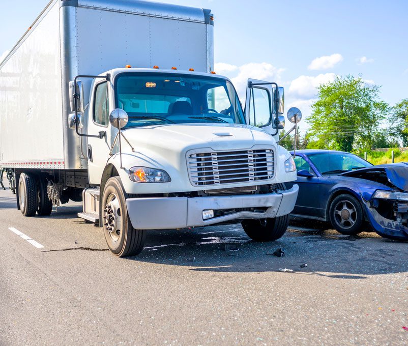 a big white truck crashes into a car, atlanta truck, accident lawyer, tractor trailers, trucking accident, experienced truck accident attorney, commercial truck, atlanta truck accident, truck accident lawyer, insurance company, trucking company